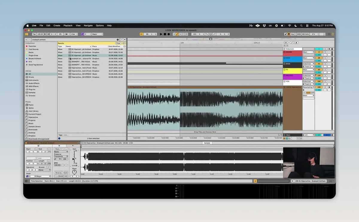 Ableton Live showing a dense stereo waveform in Arrangement View and the clip detail panel